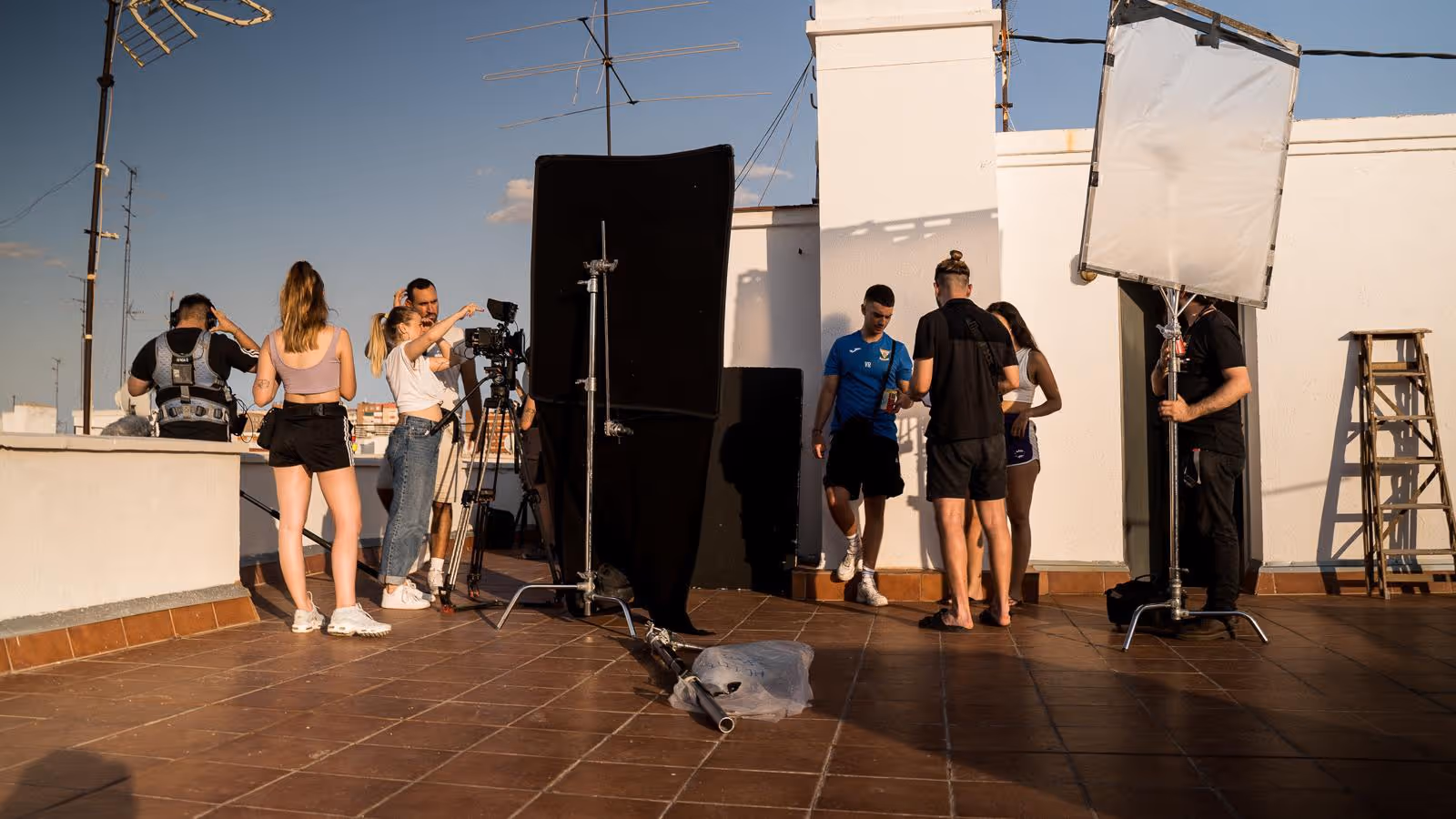 La Castellane's team during the shooting of Cinco. They are directing the actors.