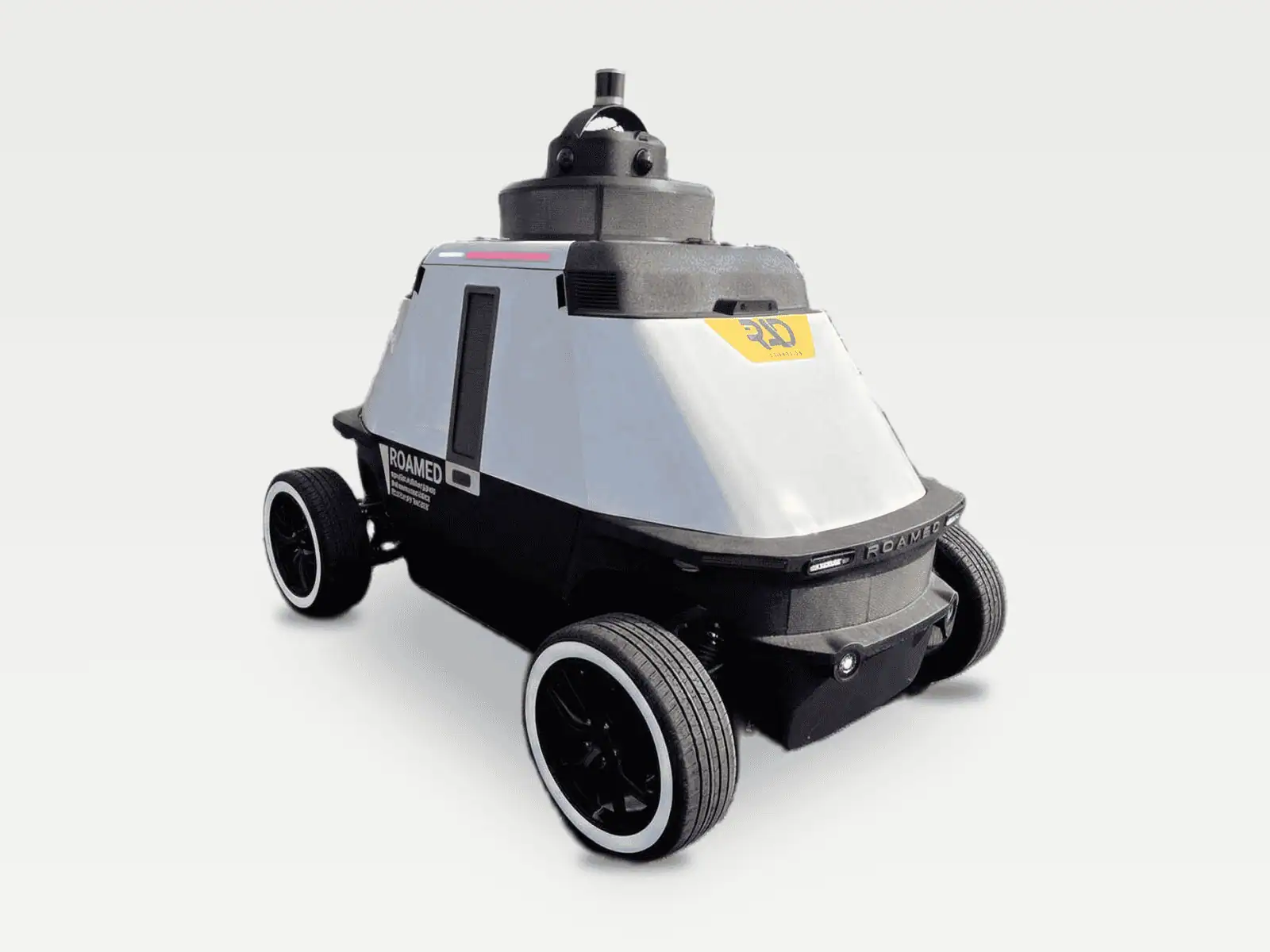 ROAMEO autonomous security patrol robot with its sensor mast, white body, and white-wall tires, on a light grey background