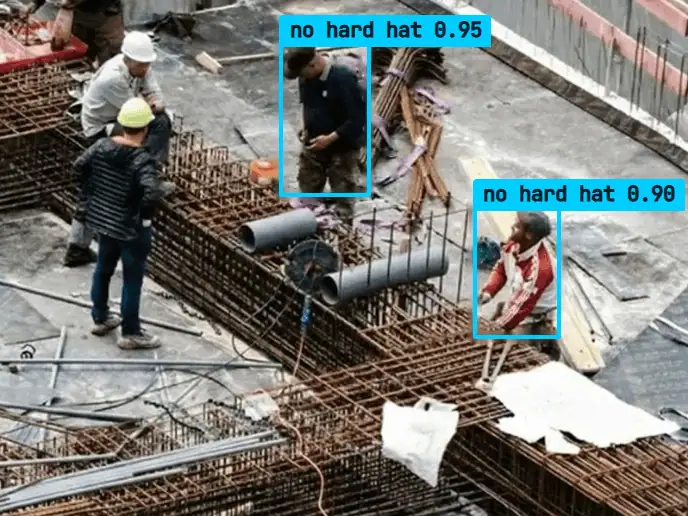Construction deck with two workers flagged for missing hard hats