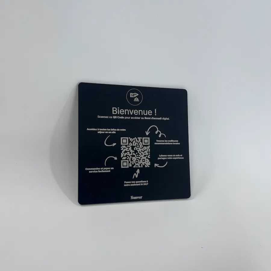 Photo of a small plexiglass QR code plate for bedroom use.