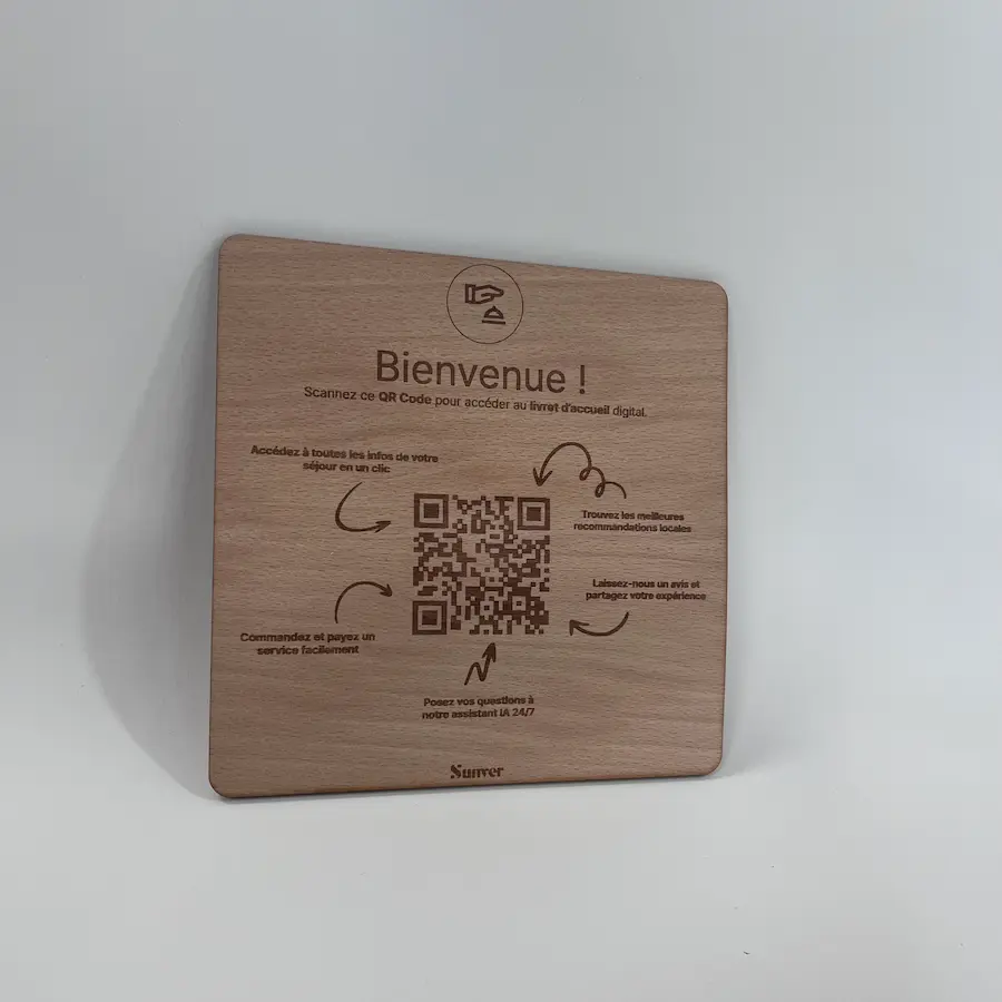 Photo of a large wooden QR code plate on a dresser.
