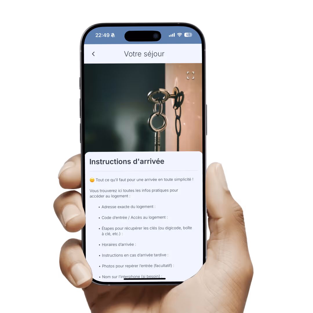Hand holding a smartphone displaying digital arrival instructions with keys photo on Sunver guidebook.