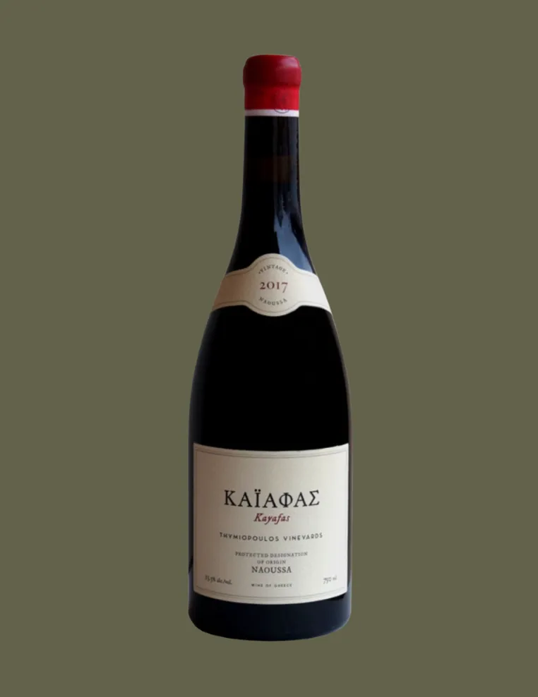 Bottle of red wine labeled Kayafas from Thymiopoulos Vineyards, vintage 2017, Naoussa.