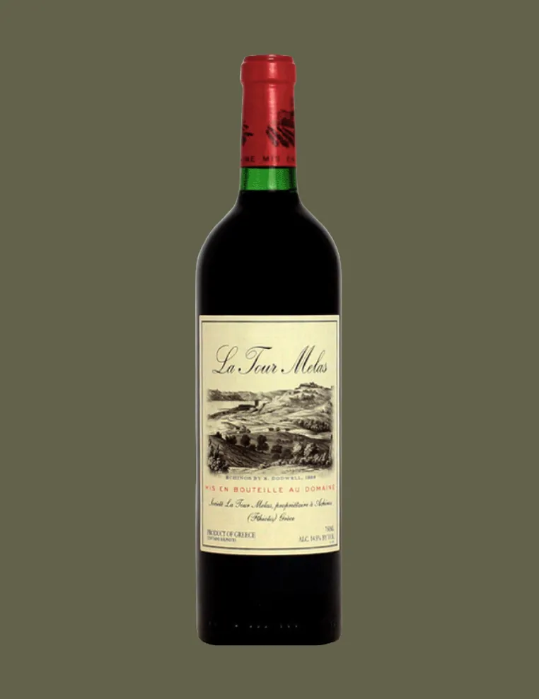 Bottle of La Tour Melas red wine with a beige label featuring a landscape sketch and red capsule.