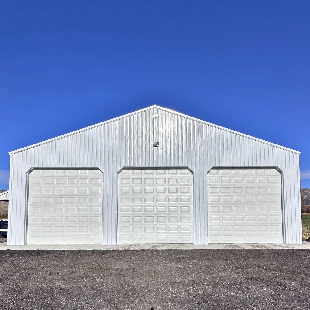 Three-bay commercial garage door installation Morgan County Utah Wilkinson Garage Doors