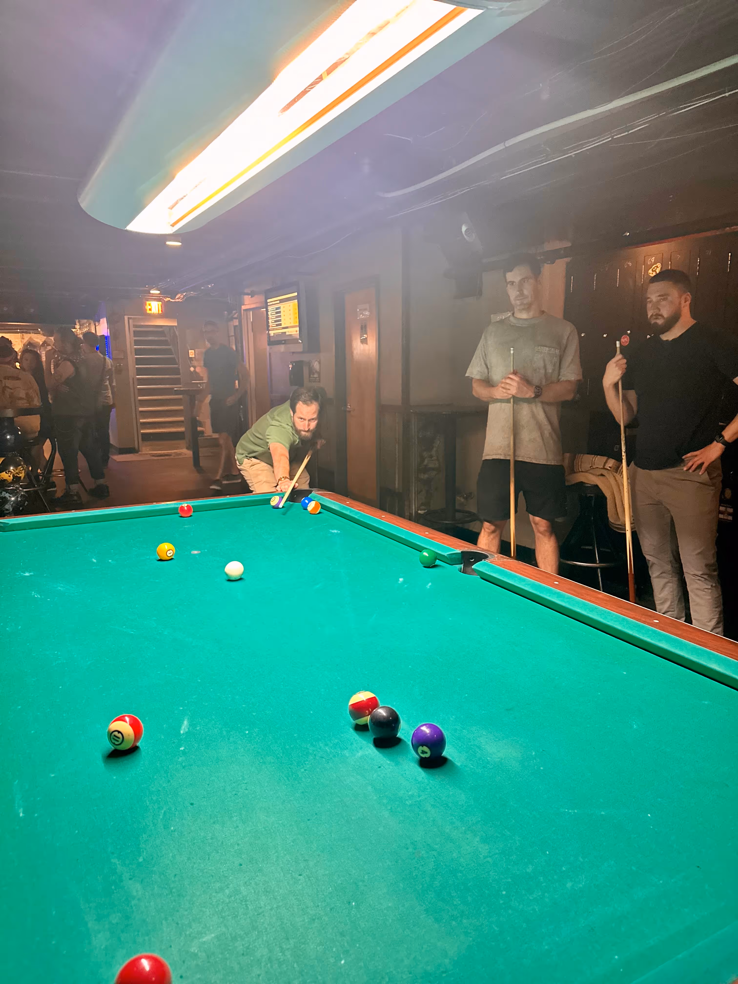 Choros members playing pool