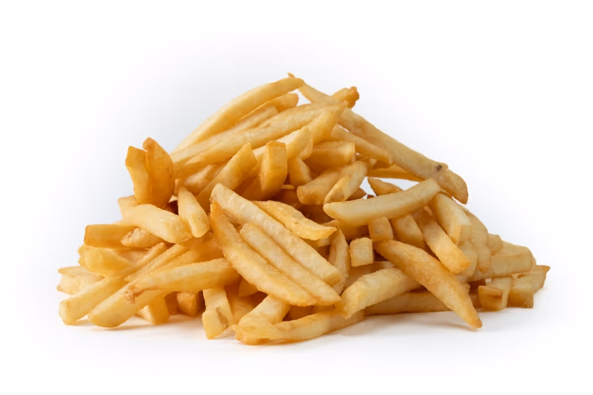 A pile of golden French fries on a white background.
