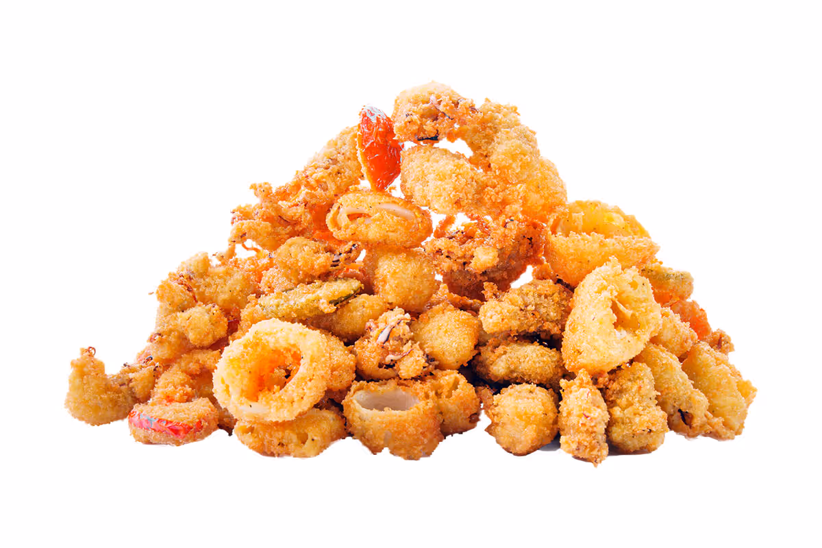 A heap of golden-brown fried seafood, including rings and pieces, isolated on a white background.
