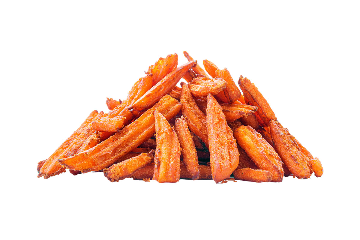 A pile of crispy sweet potato fries is arranged on a white background.