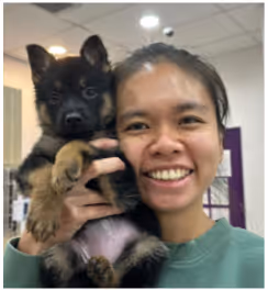 A vet holding a cute dog