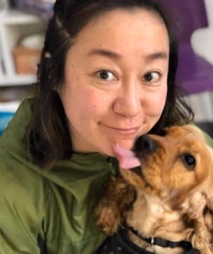 Vet holding a cute dog