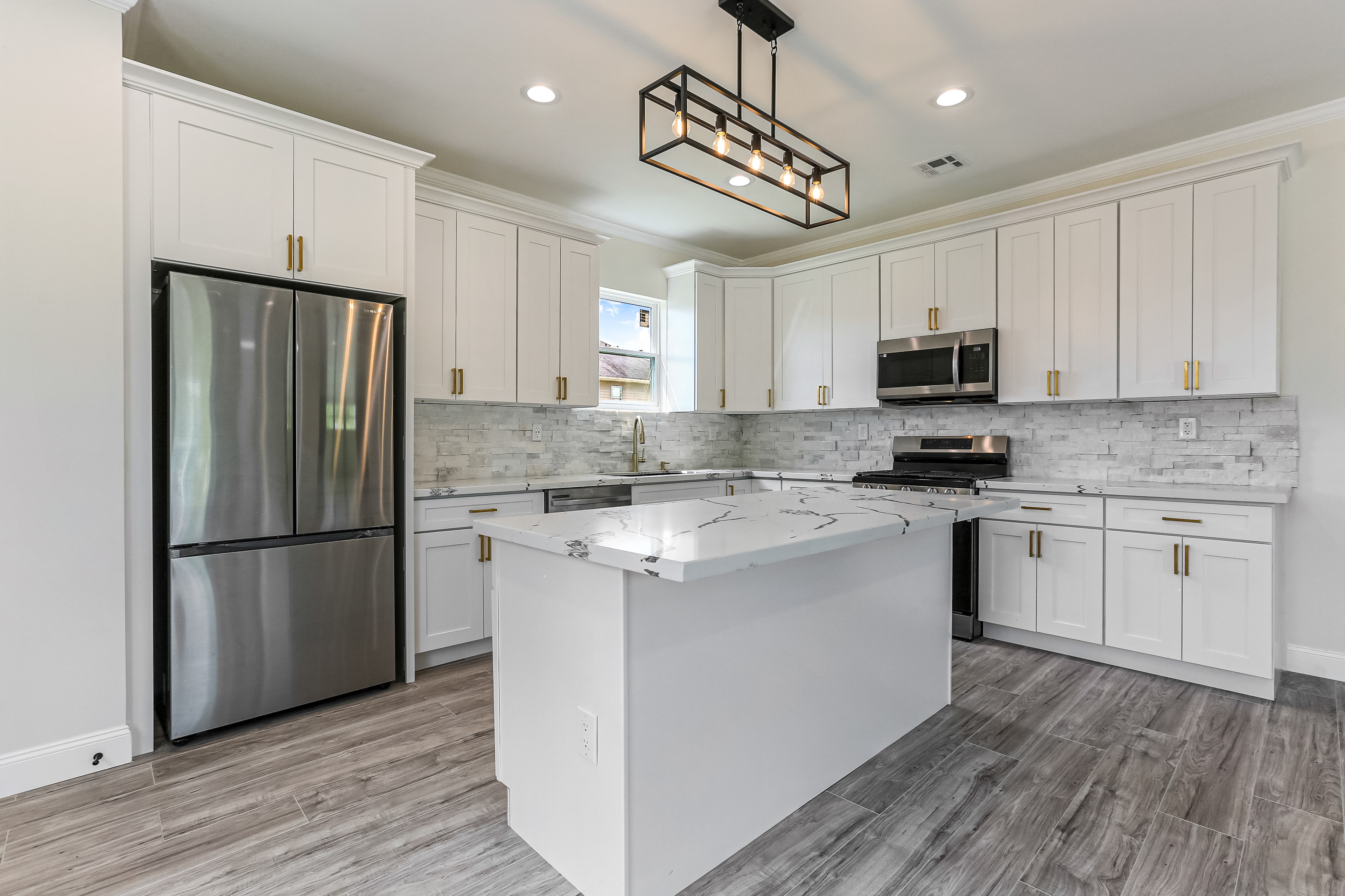 Newly renovated kitchen with granite countertop