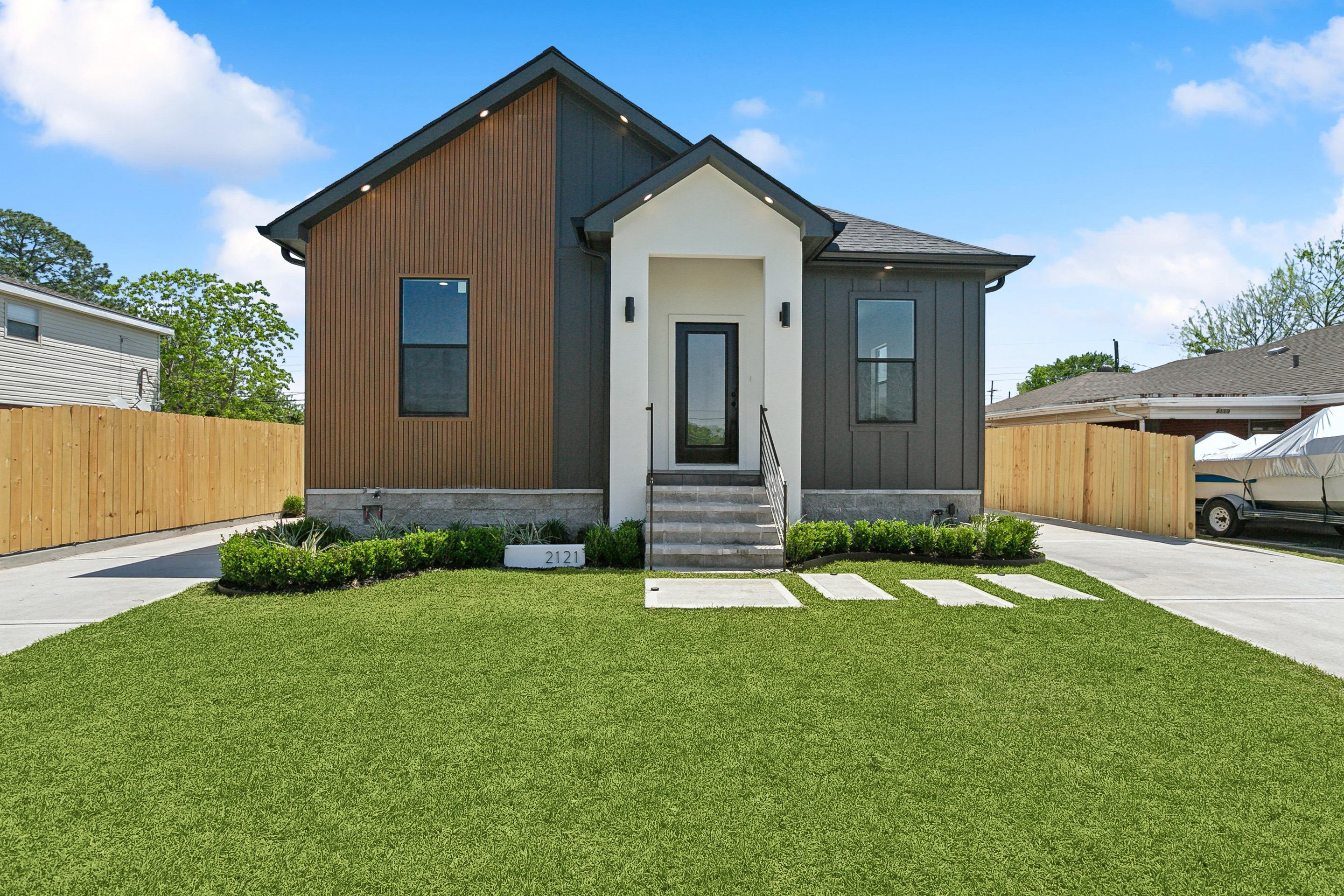 New construction duplex with exposed materials