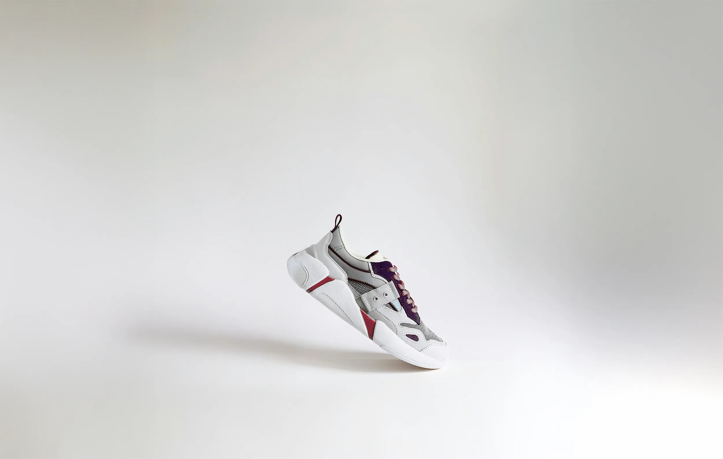 A single shoes in white background.