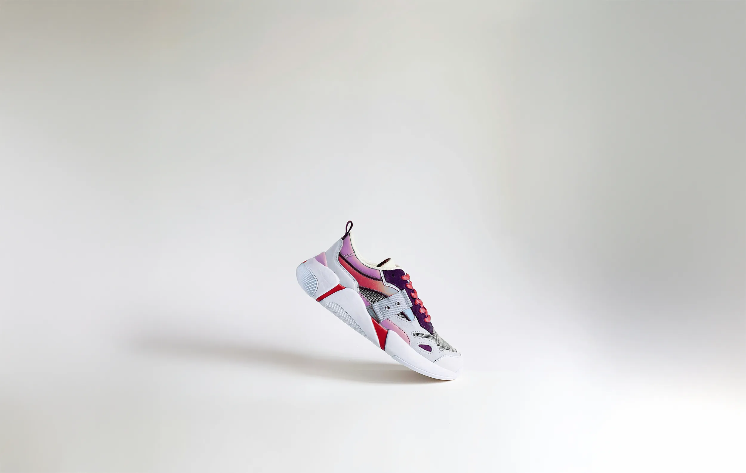 A single shoes in white background.