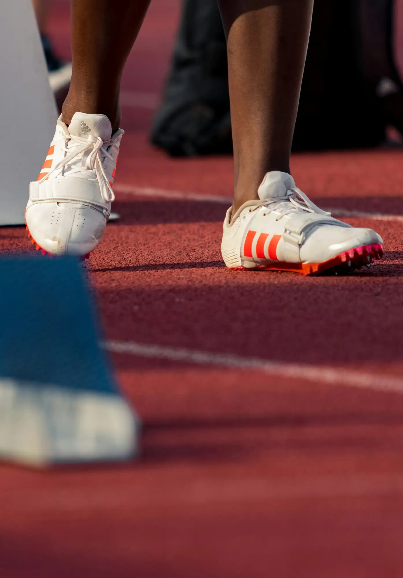 white shoes on track field.