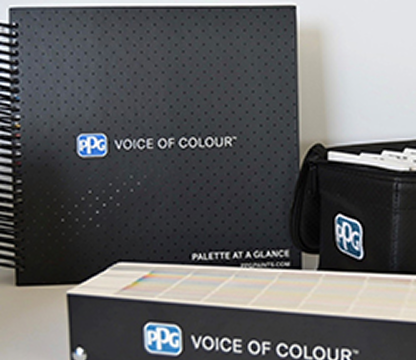PPG Voice of Colour paint sample books and a black carrying case.