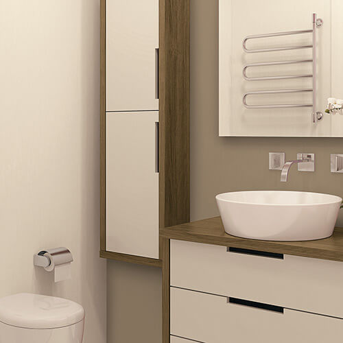 Modern bathroom corner with white toilet, wooden cabinet, white vessel sink, and wall-mounted faucet under a towel rack.