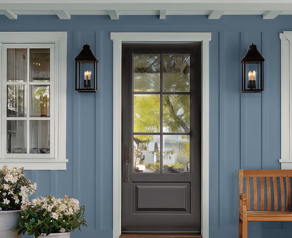 House exterior siding painted in Artifact grey