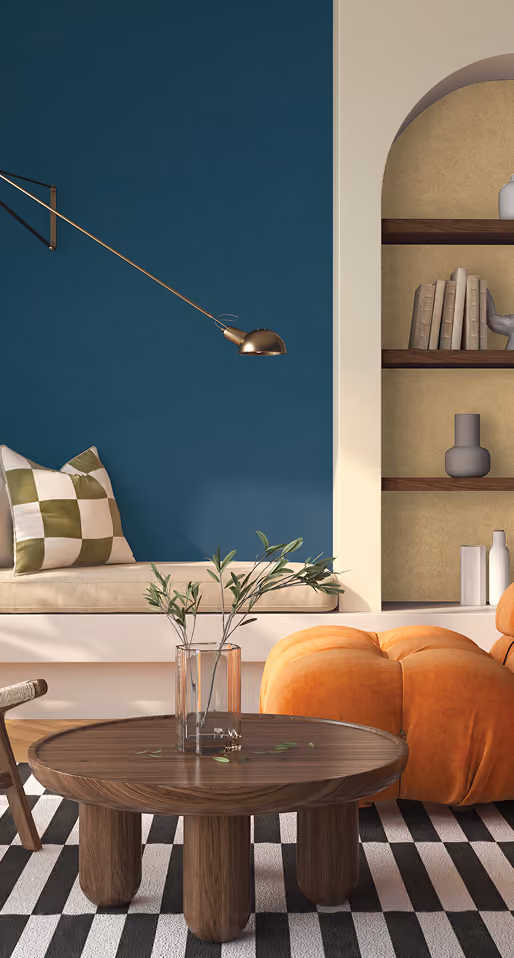 Blue accent wall and arched shelving in a living room