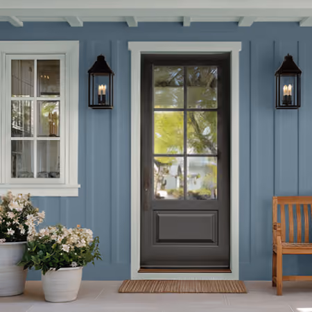 House exterior siding painted in Artifact grey