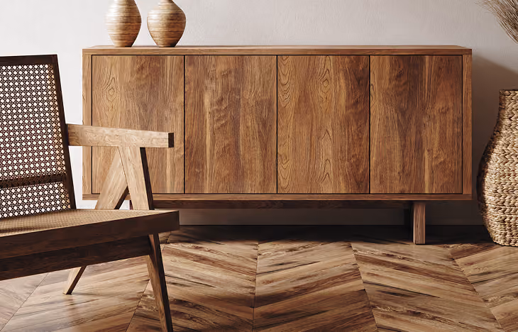 Wooden sideboard console against a beige wall