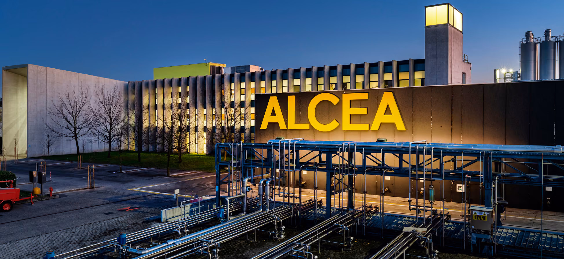 ALCEA factory building and industrial facility at dusk