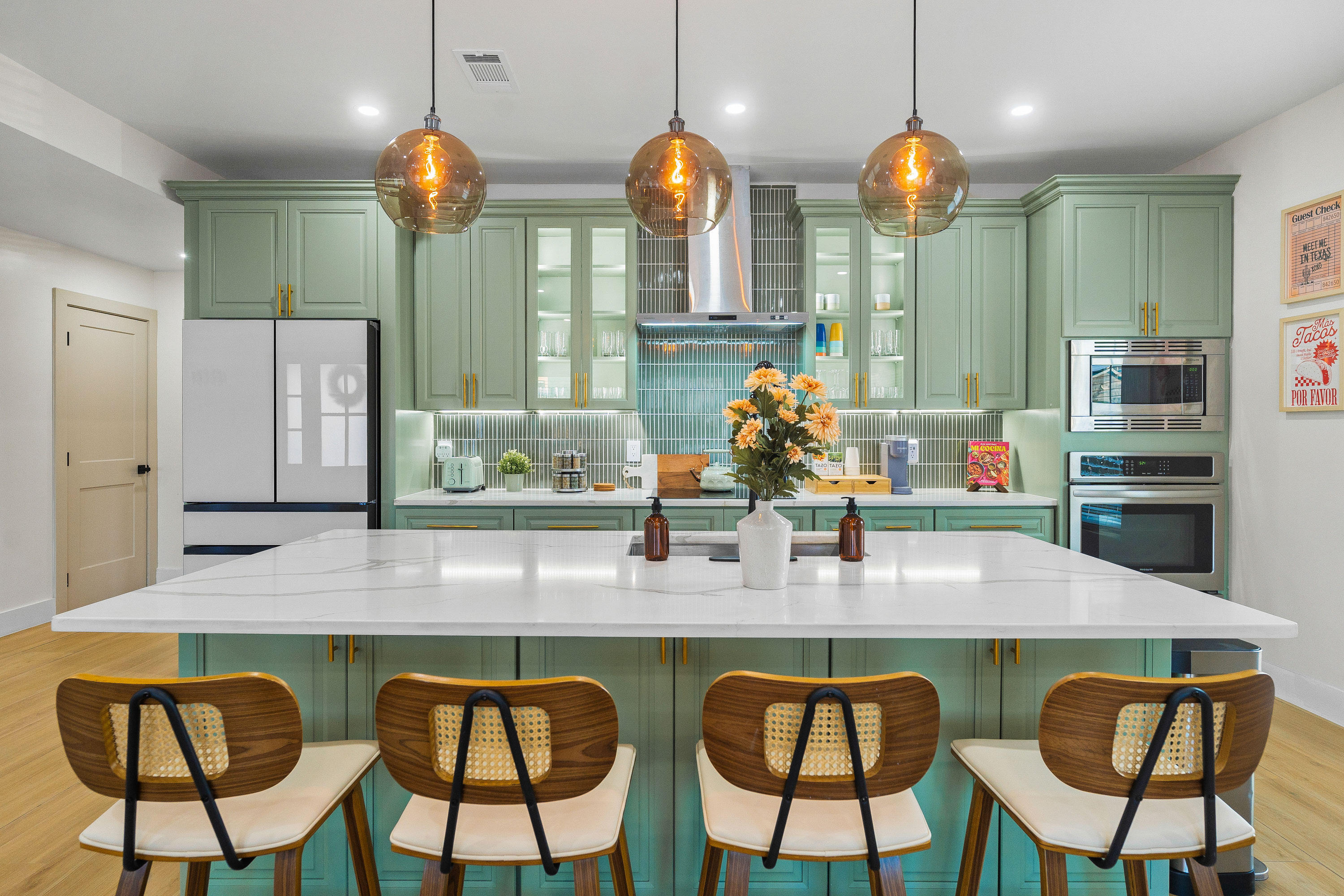 Modern kitchen and dining area inside 736 E Myrtle vacation rental in San Antonio.