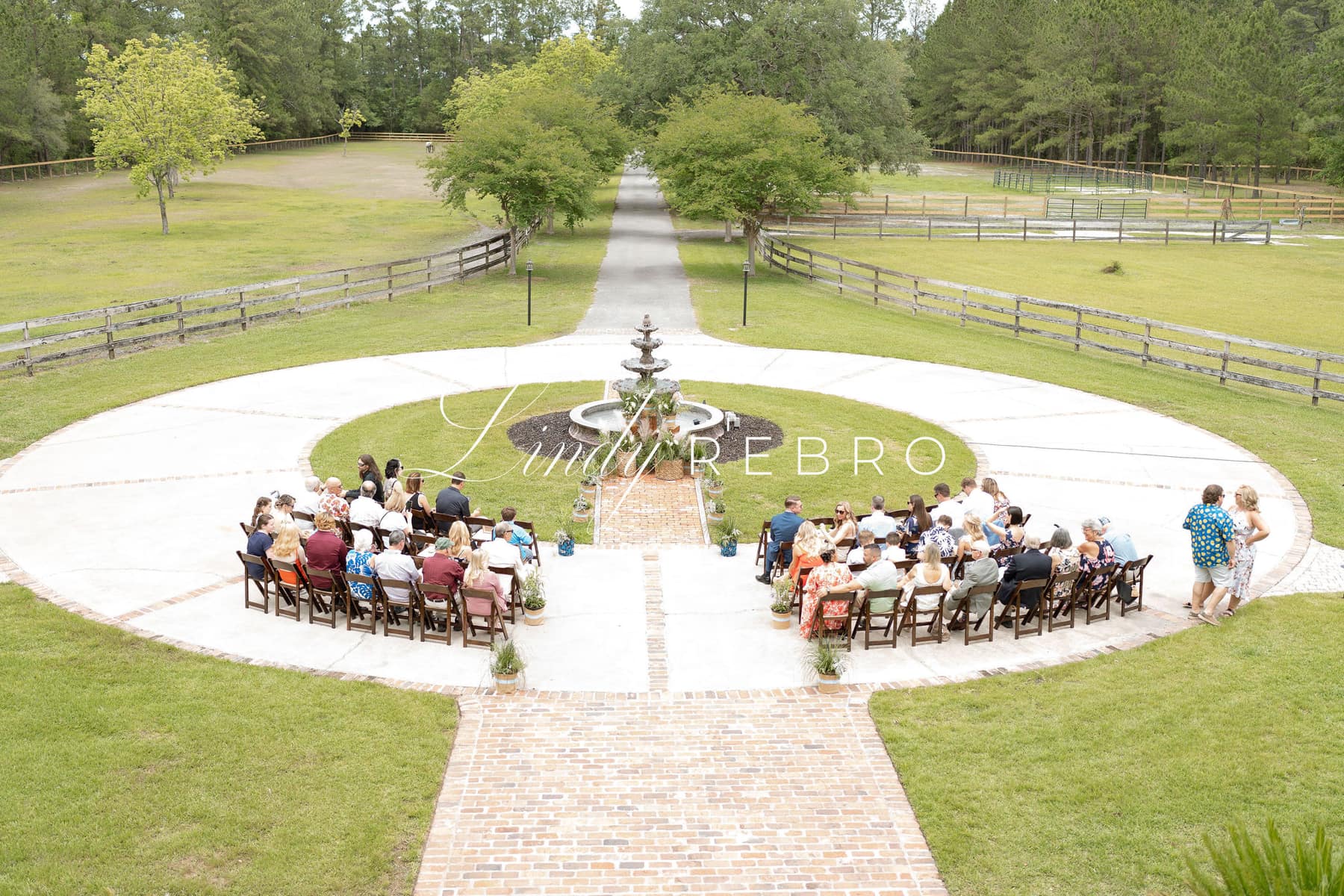 Bride with horse and carriage at Satolah Creek Farm wedding venue in North Gerogia
