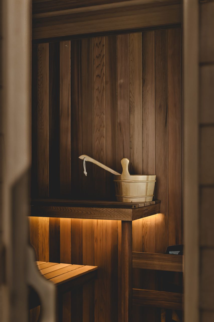 Soft indirect sauna lighting and integrated temperature control