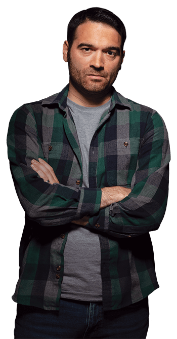 A man crossing his arms, looking upset