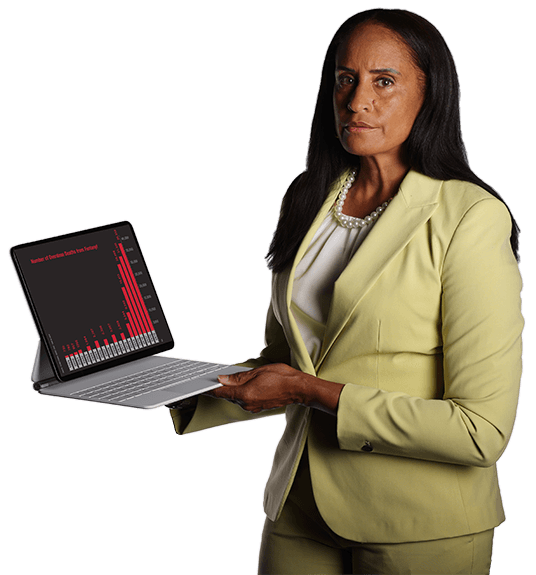 A woman in professional clothing holding up a laptop with a chart on it