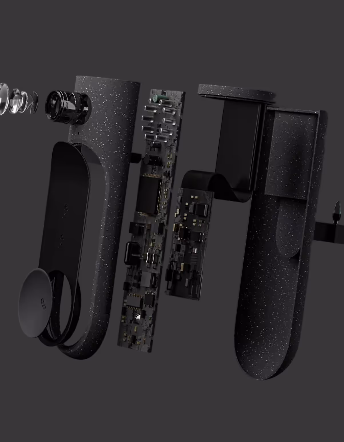 Exploded view of a black electronic device showing its internal circuit boards, lens components, and structured casing parts.