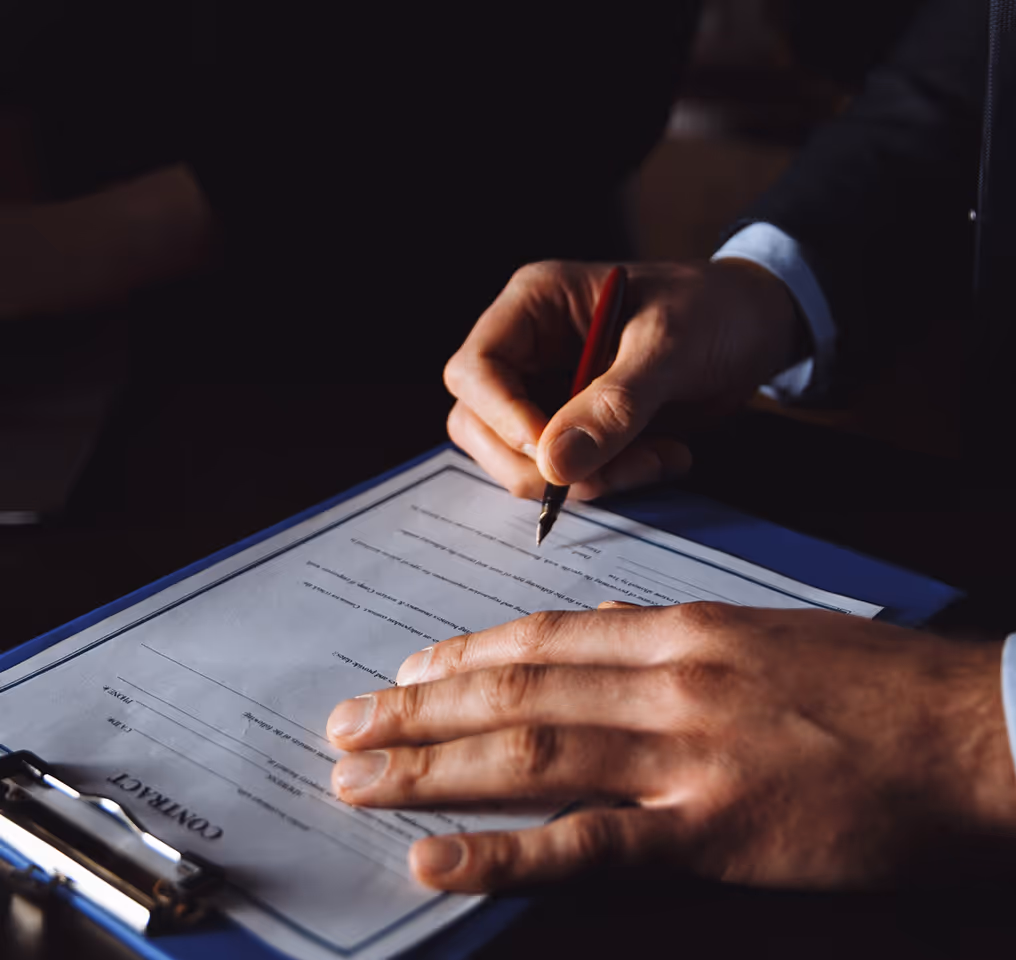 a person signing a contract