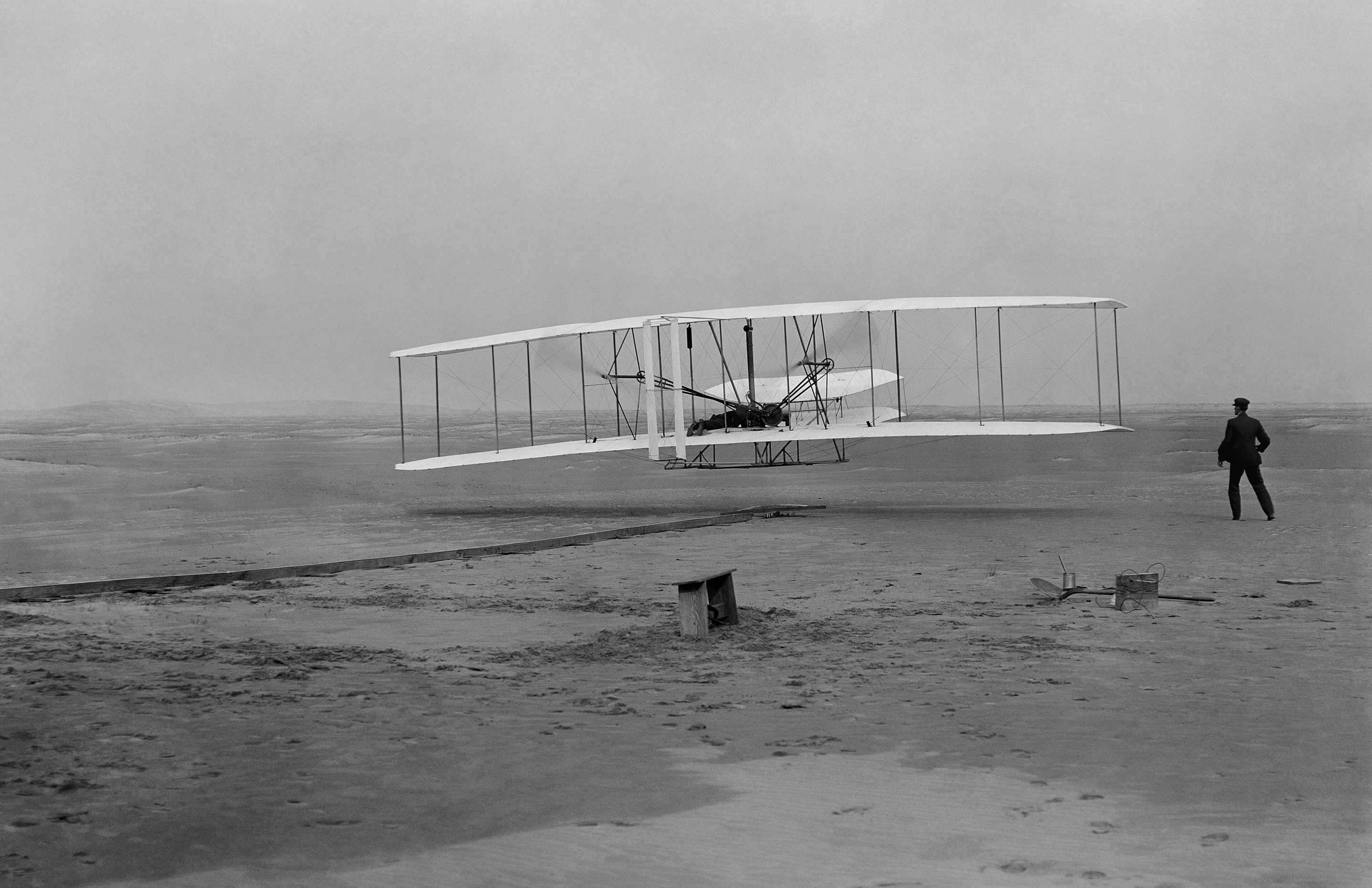 Kitty Hawk, North Carolina — December 17, 1903. The first powered flight lasted twelve seconds.