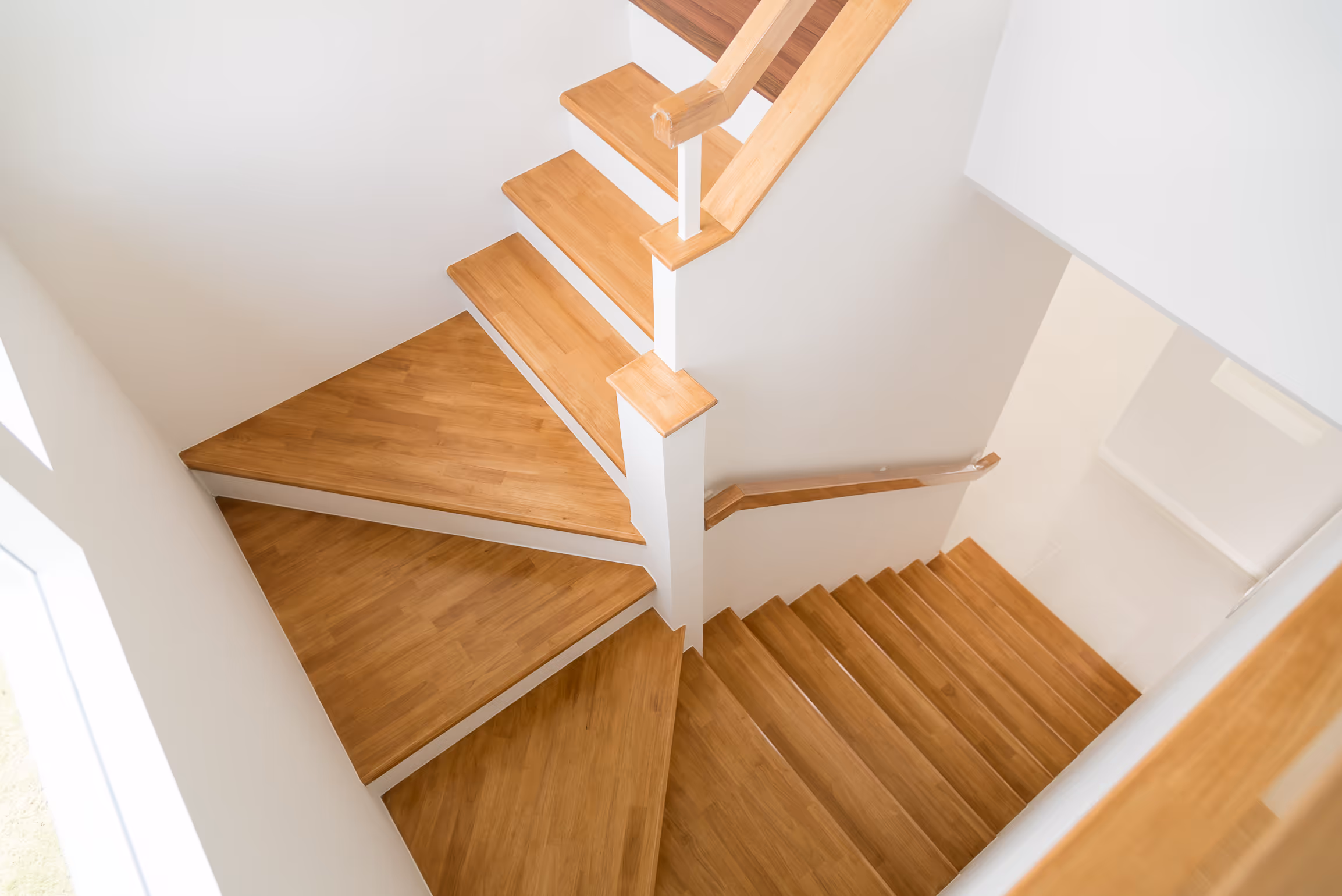 Spiral modern wooden staircase