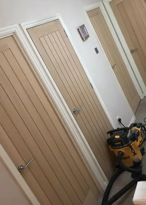 Oak wooden doors in a landing corridor