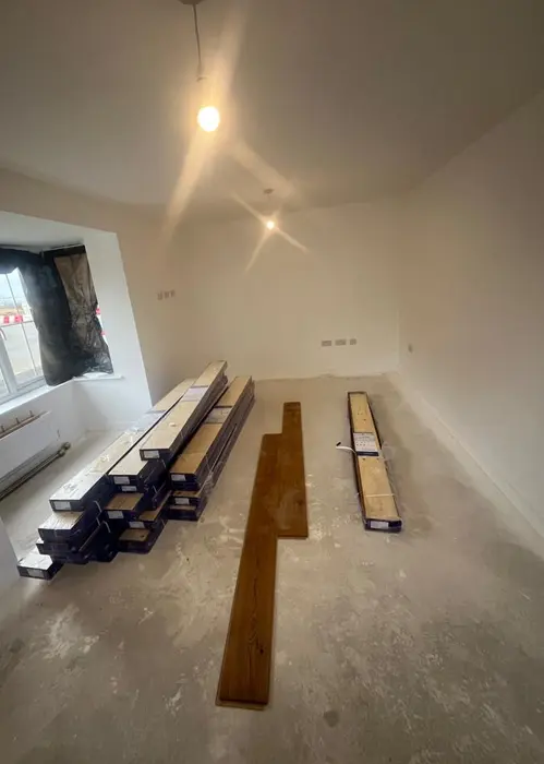 Floorboards laid out on floor