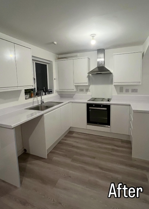 White kitchen with walnut flooring