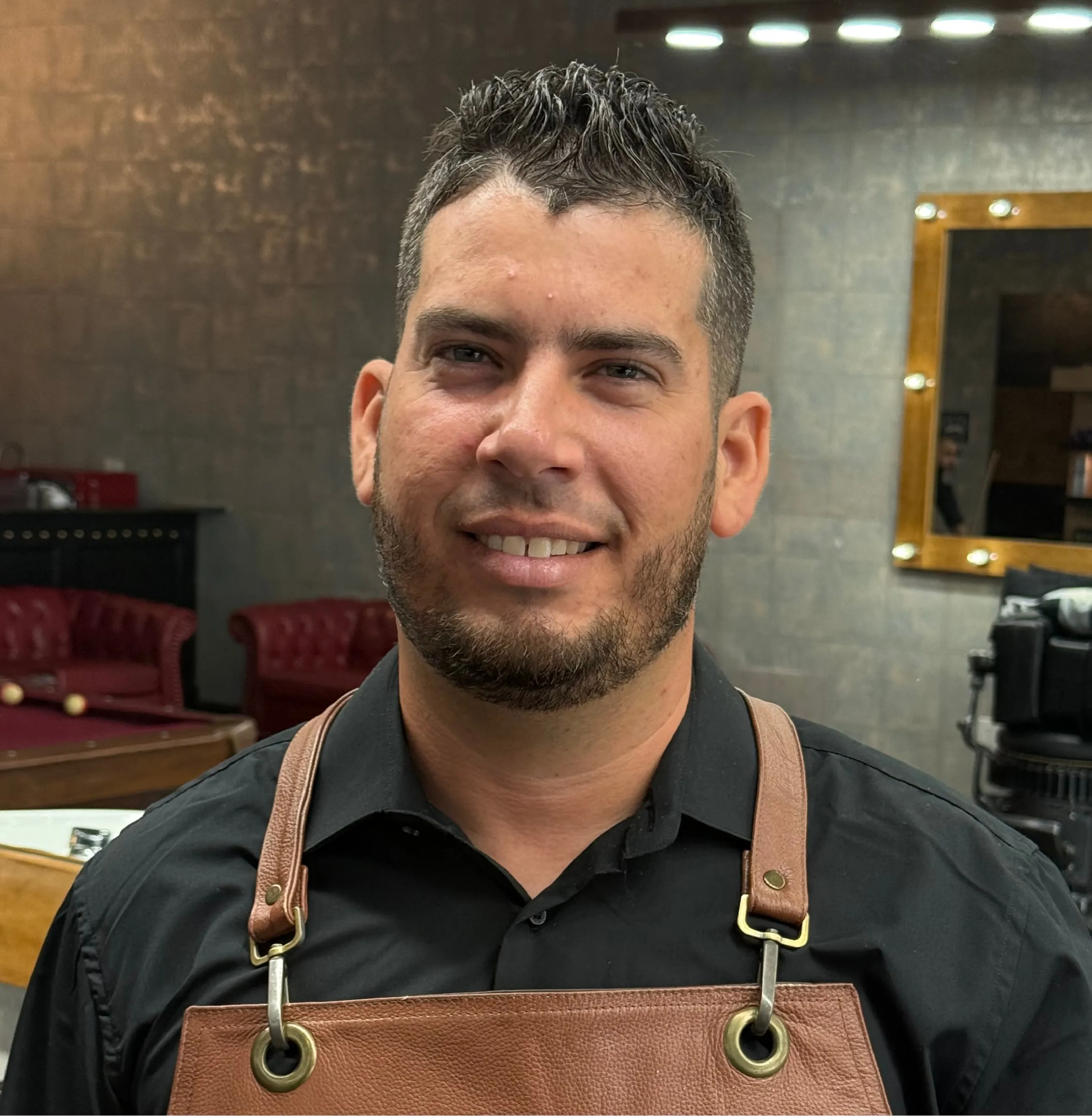 Abel Headshot and he is smiling at the camera.