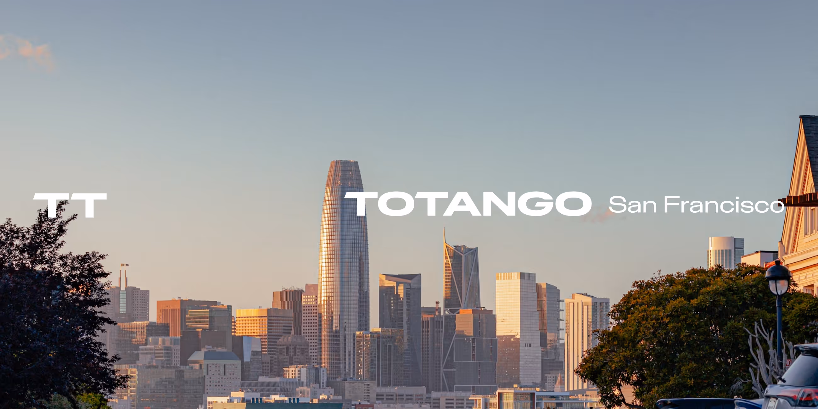 San Francisco city skyline at sunset with modern skyscrapers, including the Salesforce Tower, and the text 'TOTANGO San Francisco' overlaying the image.
