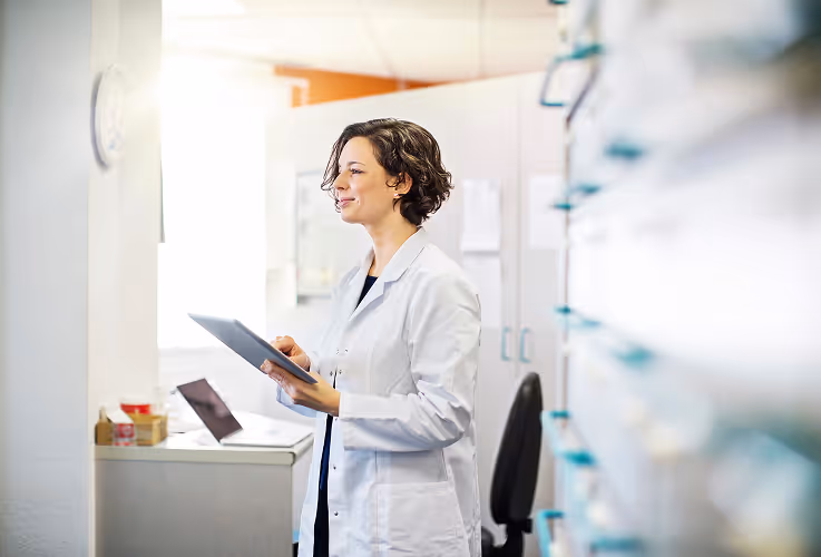A doctor using a Digital tablet, portrait photo