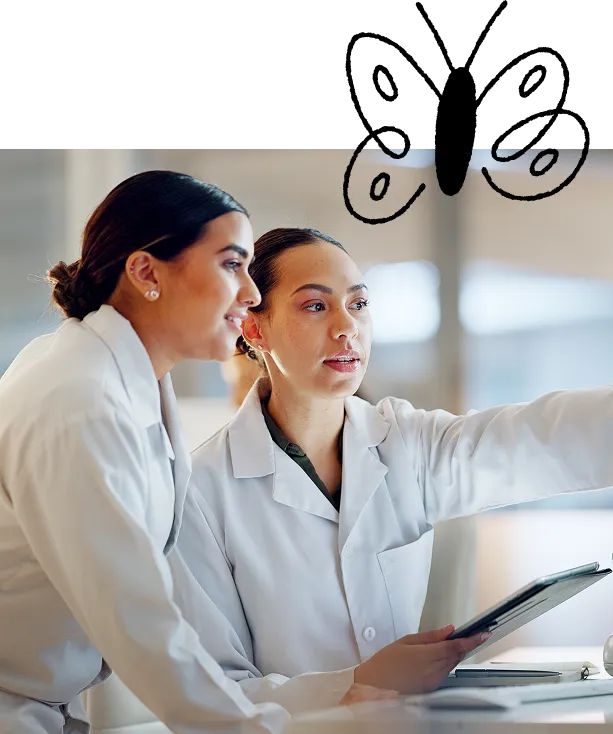 A Photograph of two clinicians discussing