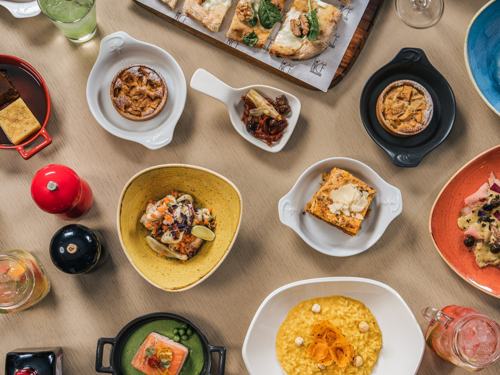 Assorted dishes arranged on a table from above