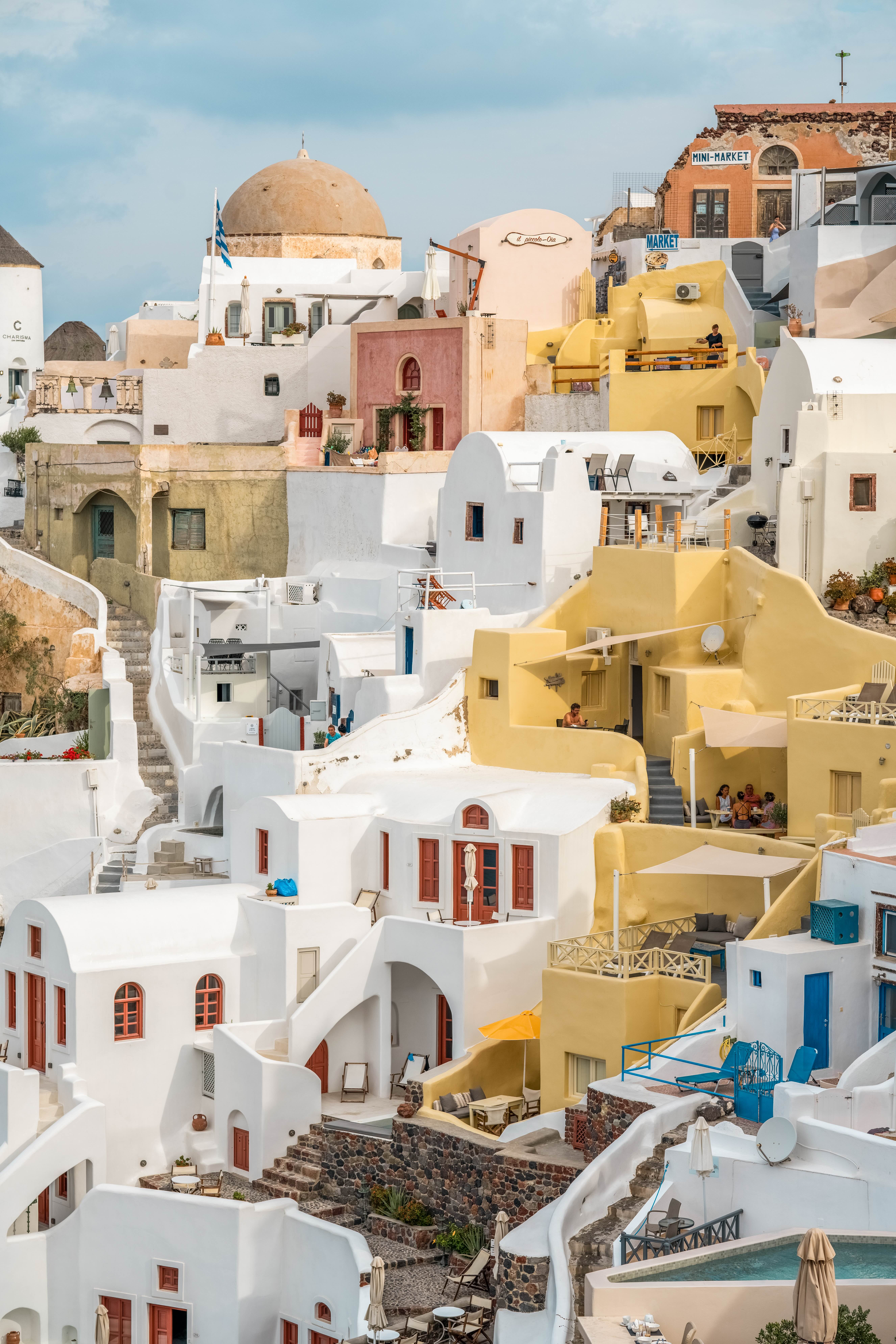 Scenic view of Oia, Santorini with colorful houses cascading down the cliff