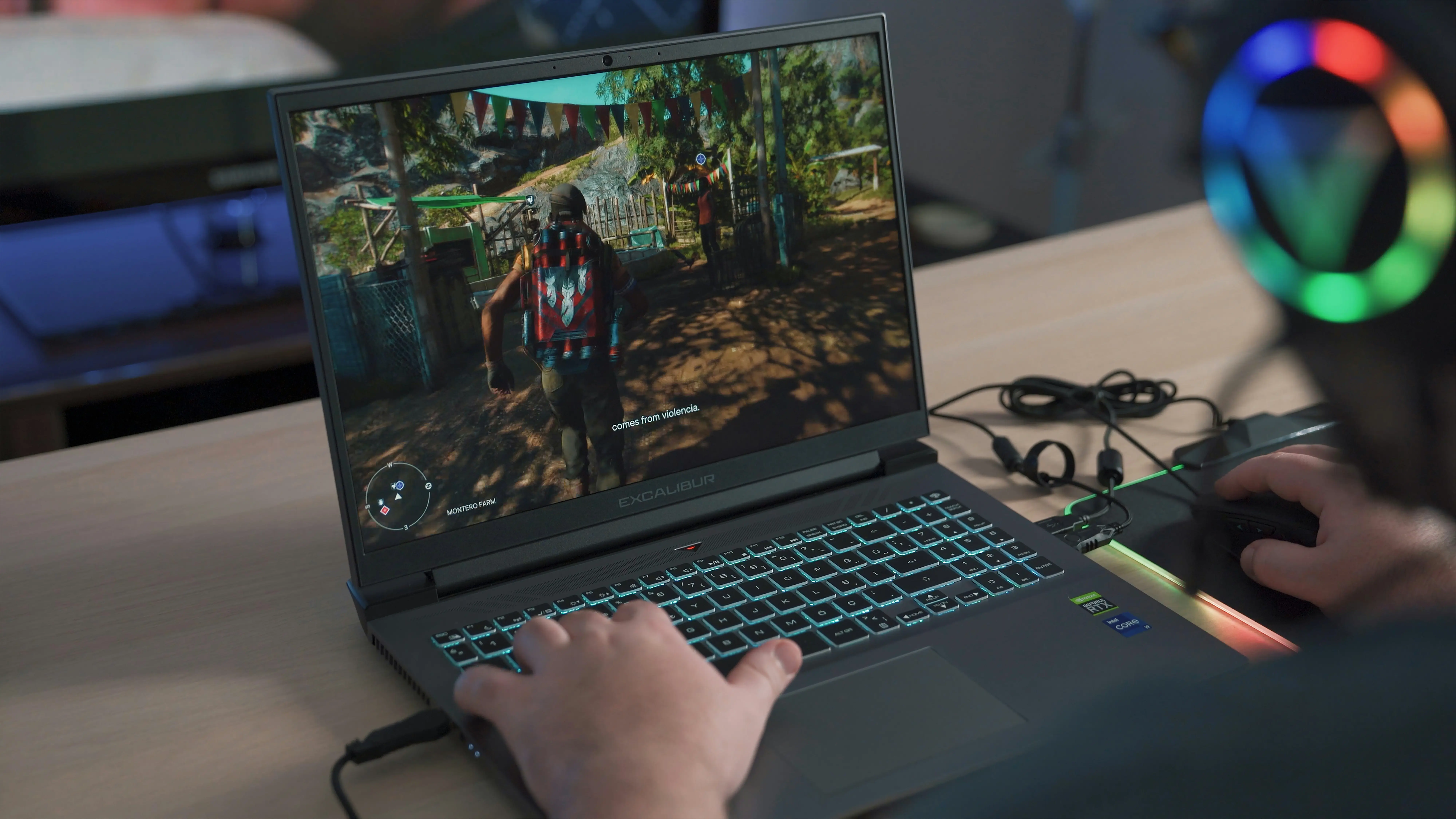A close-up of a laptop showing a video game.