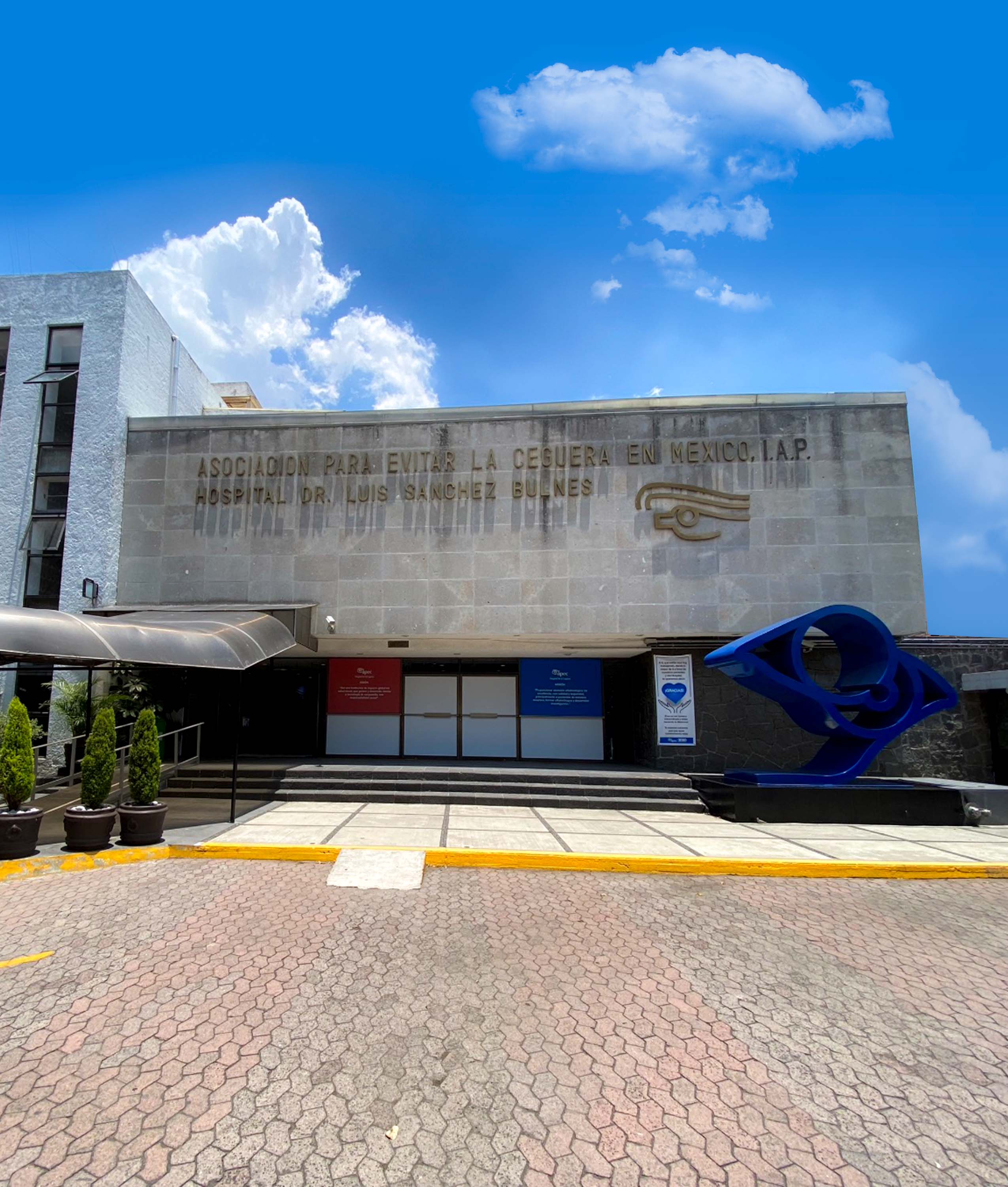 Young woman wearing glasses smiles