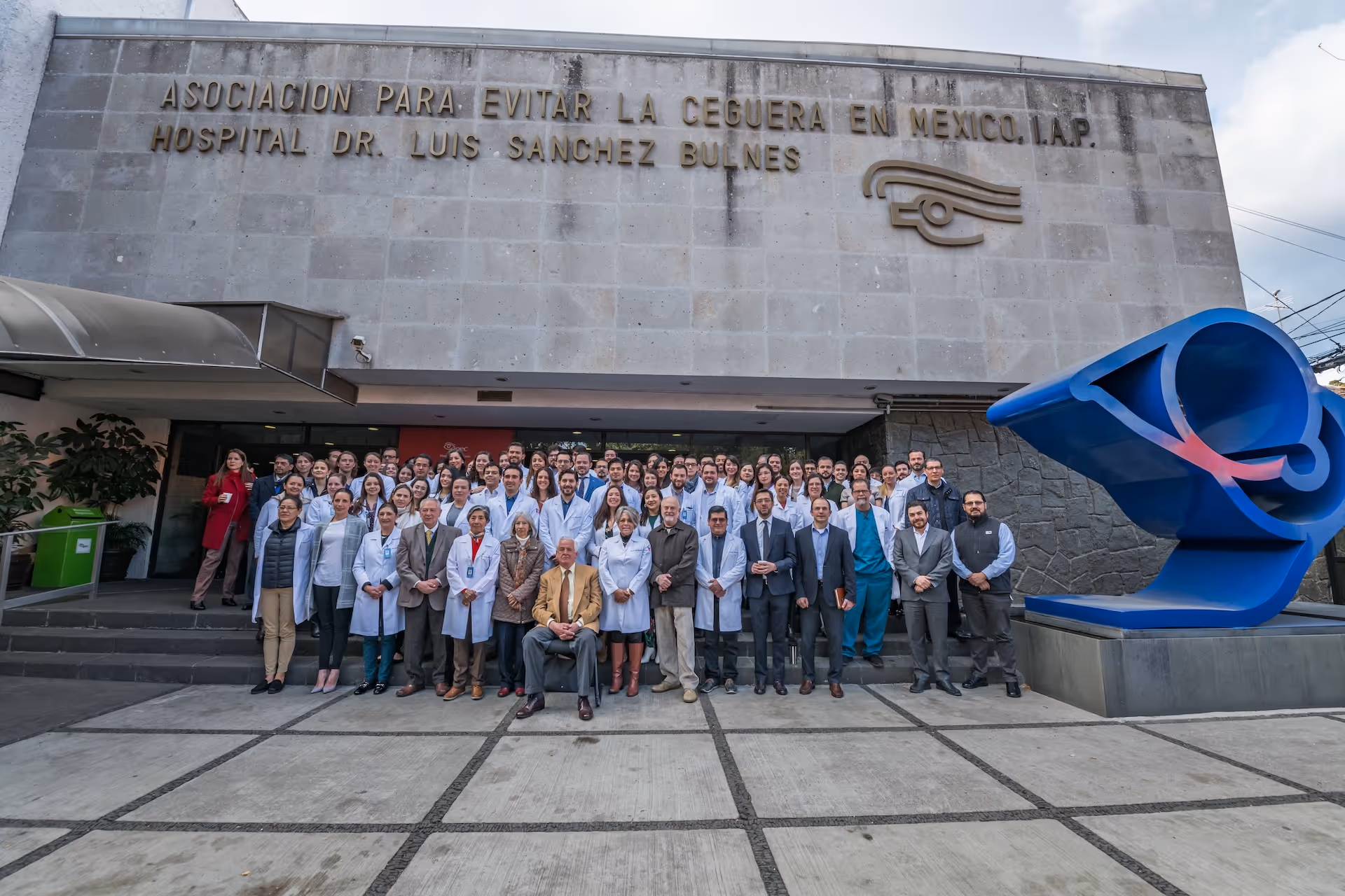 Young woman wearing glasses smiles