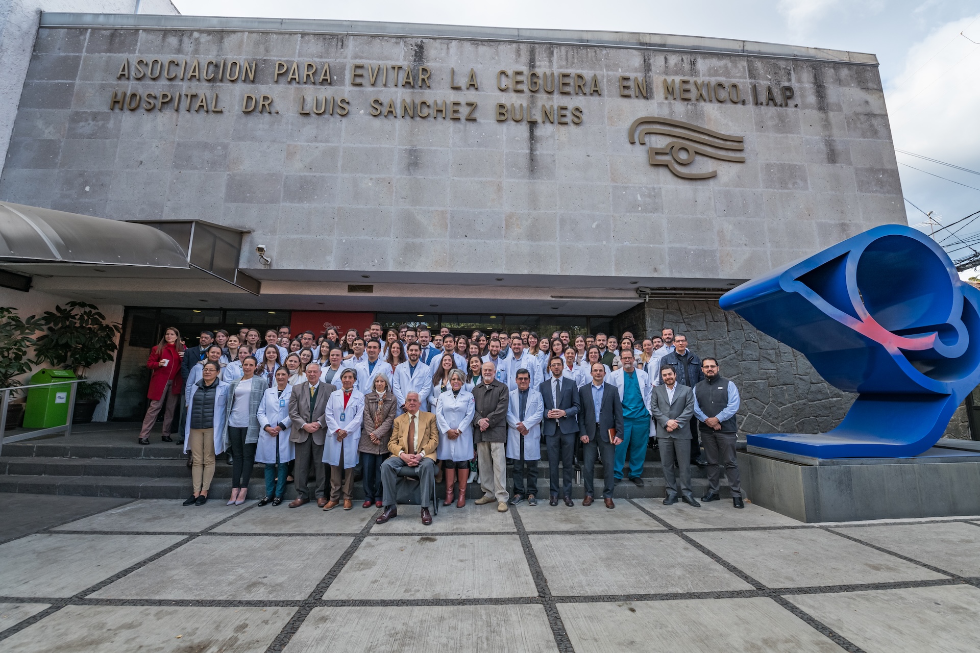 Young woman wearing glasses smiles