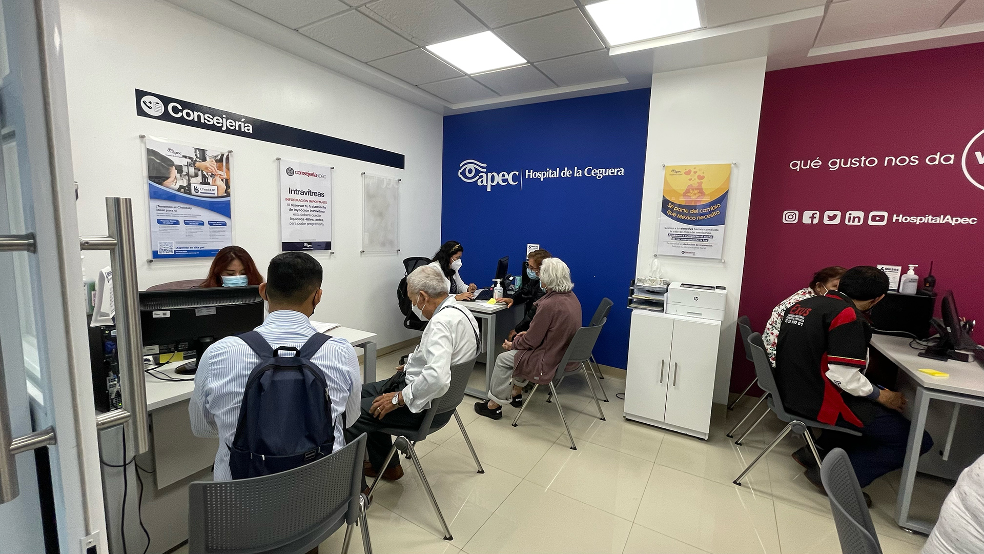 Young woman wearing glasses smiles
